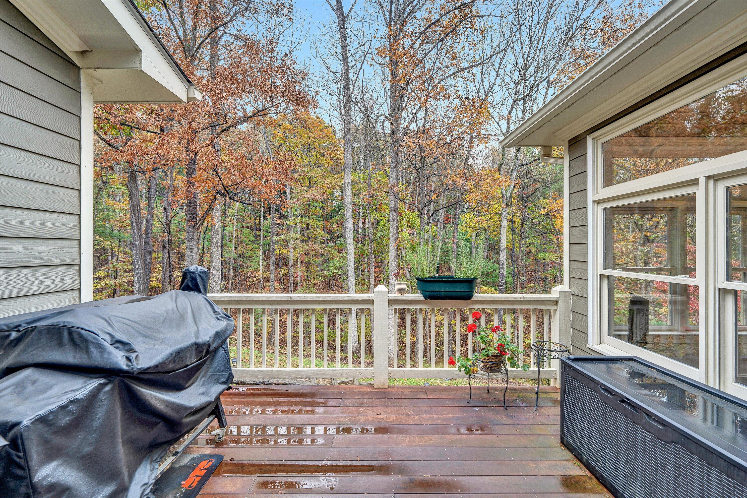 5431 Ridgelea Estates Drive Roanoke, VA 24018 - Photo 26 of 71 a view of a patio with a table and chairs