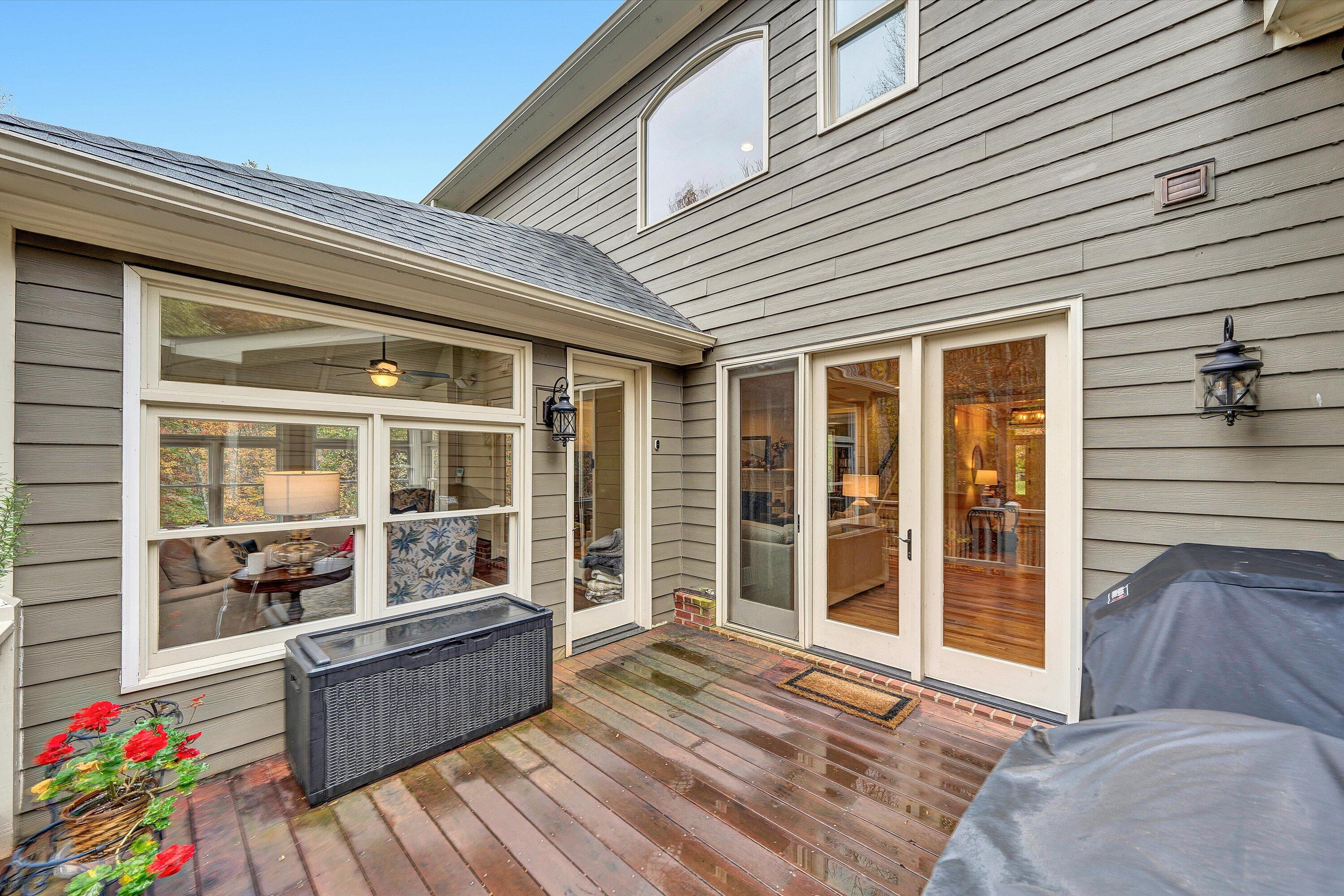 5431 Ridgelea Estates Drive Roanoke, VA 24018 - Photo 28 of 71 a view of a deck with wooden floor and floor to ceiling window
