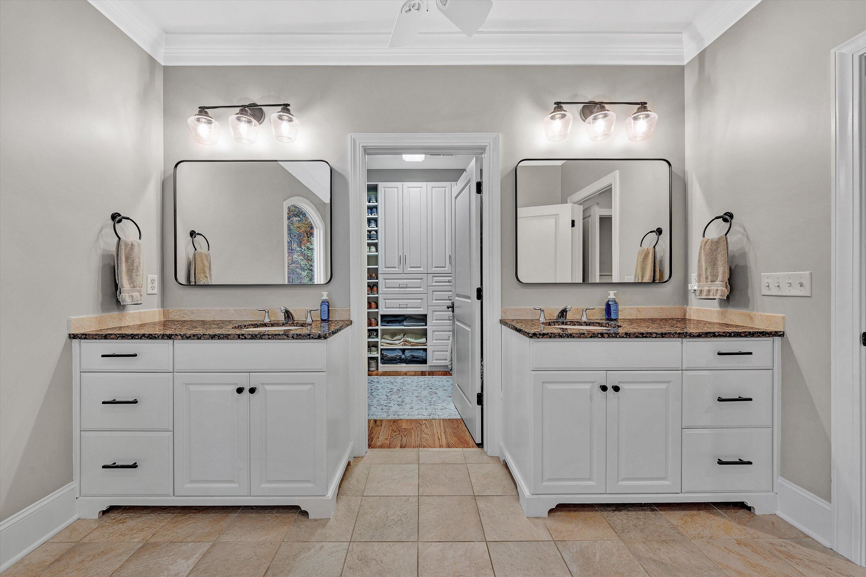 5431 Ridgelea Estates Drive Roanoke, VA 24018 - Photo 33 of 71 a bathroom with a granite countertop sink vanity and mirror