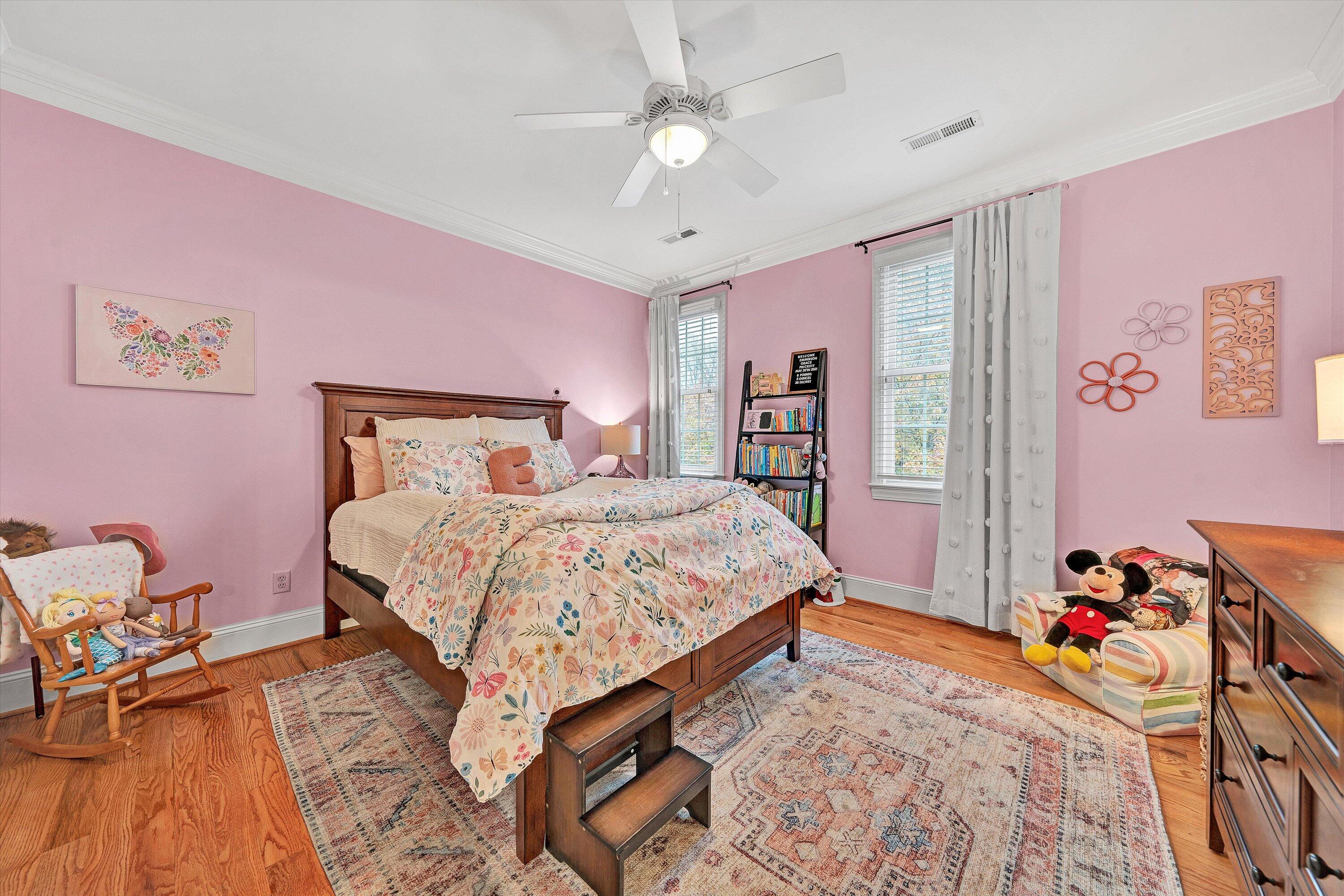 5431 Ridgelea Estates Drive Roanoke, VA 24018 - Photo 44 of 71 a bedroom with a bed and a chandelier