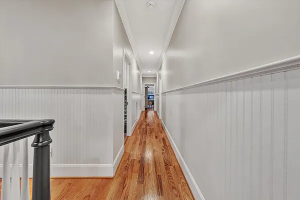 a wooden bench sitting in middle of the yard