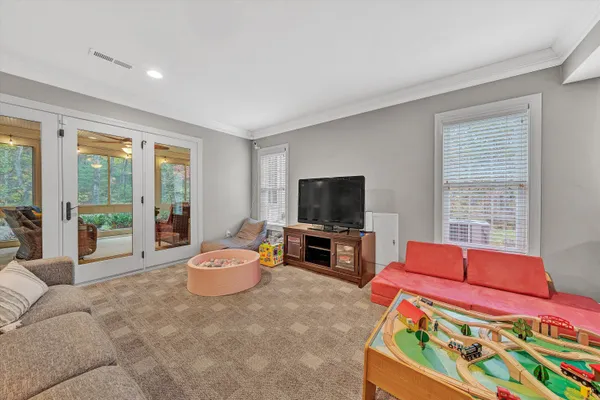 a view of a backyard with garden and plants