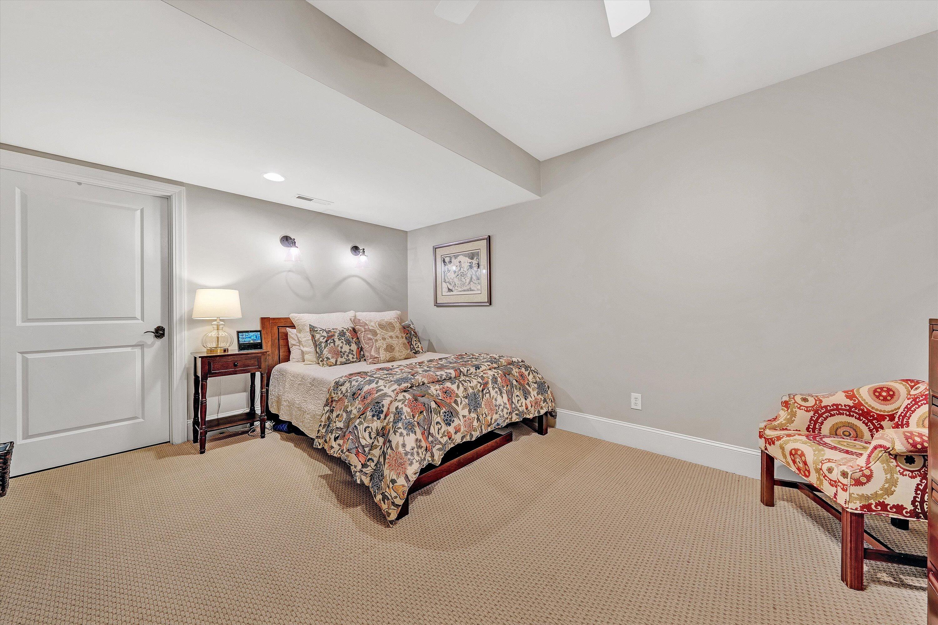 5431 Ridgelea Estates Drive Roanoke, VA 24018 - Photo 54 of 71 a bedroom with a bed and a lamp on the dresser
