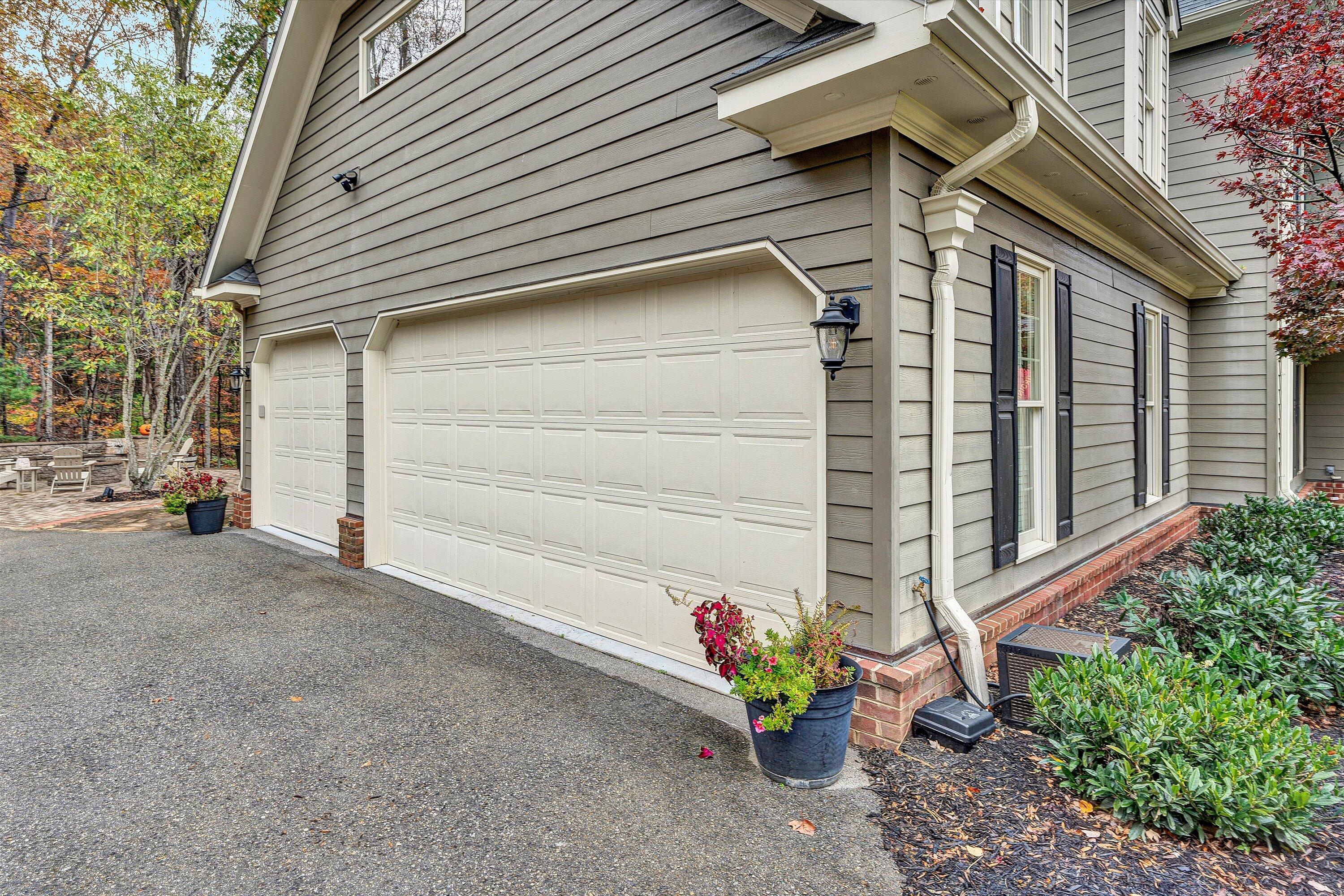 5431 Ridgelea Estates Drive Roanoke, VA 24018 - Photo 58 of 71 a view of a house with a yard and a garage