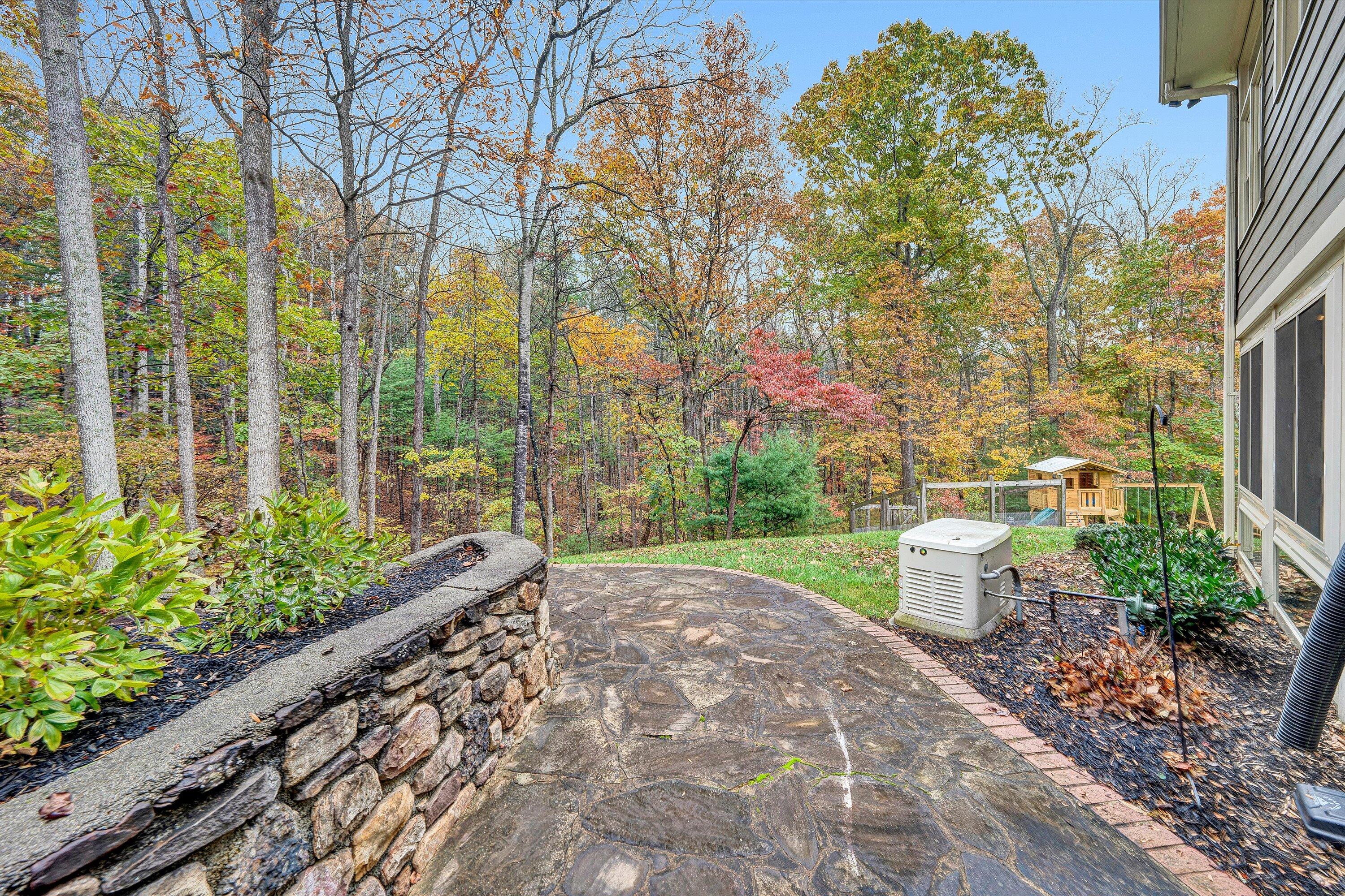 5431 Ridgelea Estates Drive Roanoke, VA 24018 - Photo 66 of 71 a view of a backyard with garden and plants