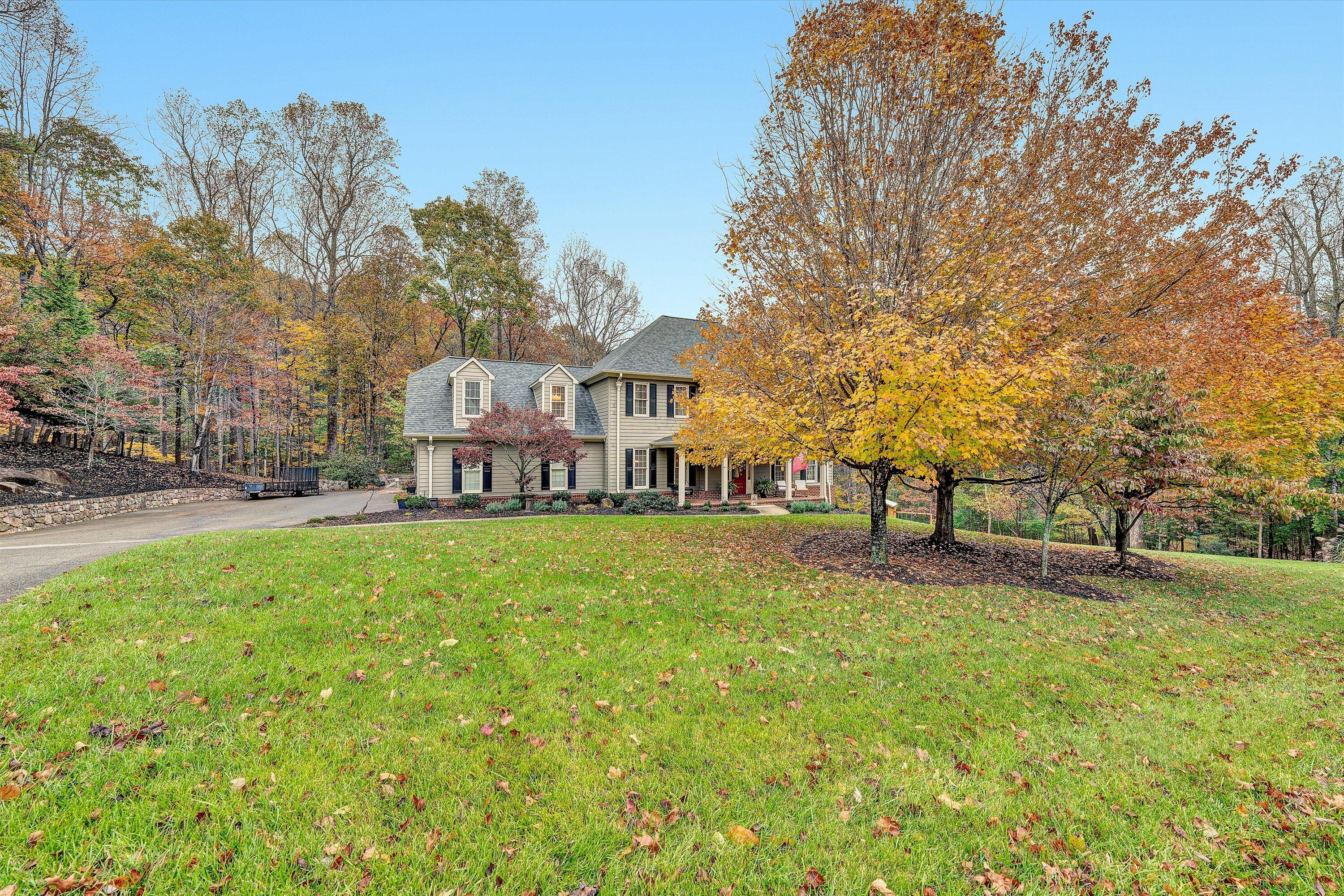 5431 Ridgelea Estates Drive Roanoke, VA 24018 - Photo 70 of 71 a view of a house with a big yard and large trees