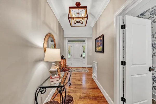 a bathroom with a sink toilet and mirror