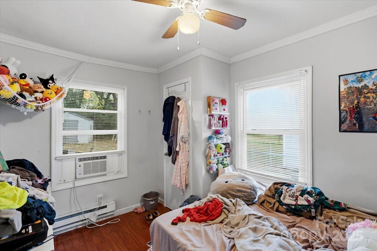 401 North Myrtle Street Gastonia, NC 28052 - Photo 7 of 14 a bedroom with bed and a window