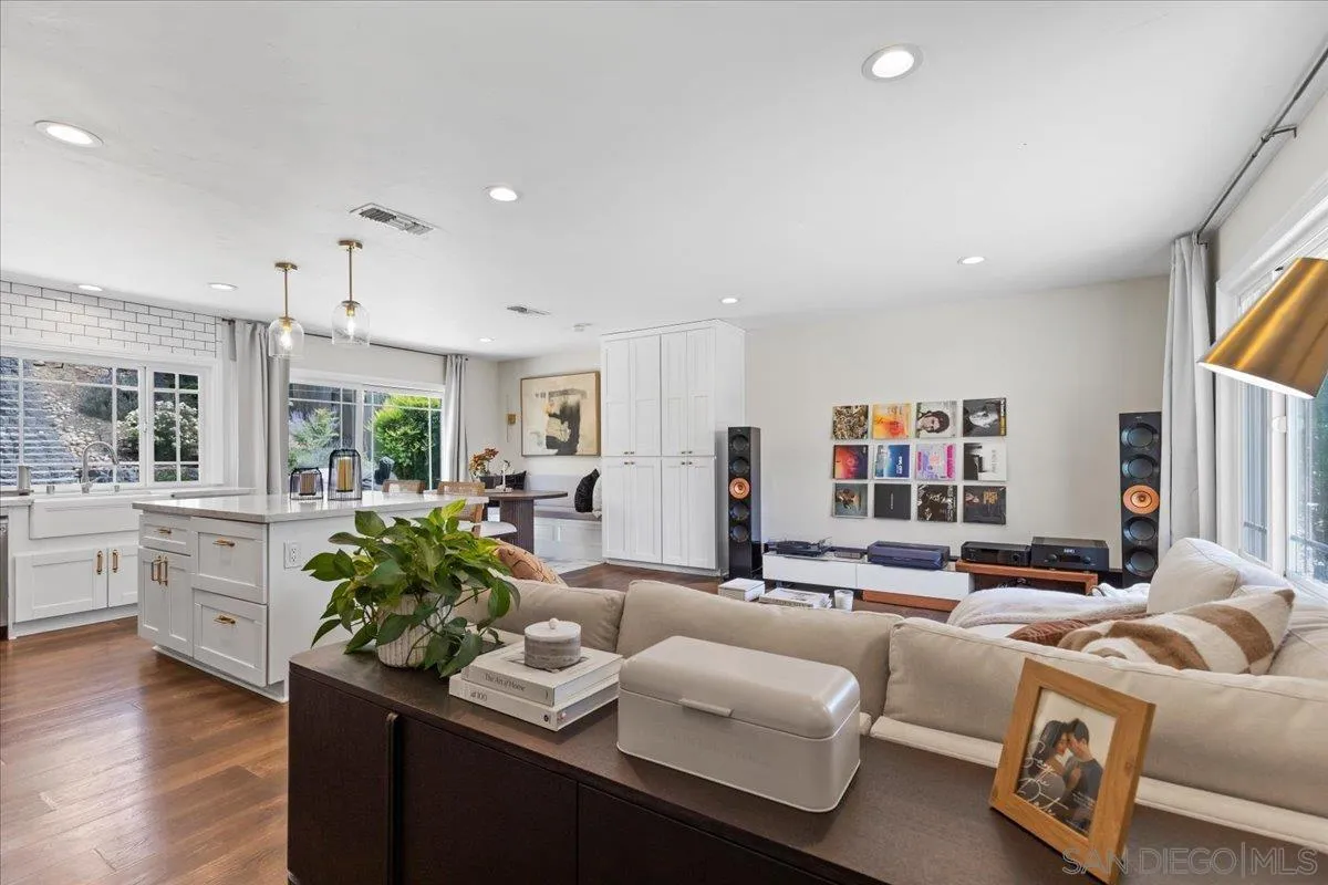 12243 Buckskin Trail Poway, CA 92064 - Photo 6 of 41 a living room with furniture fireplace and wooden floor