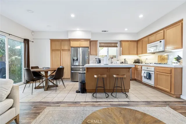 a dining table chair and kitchen view