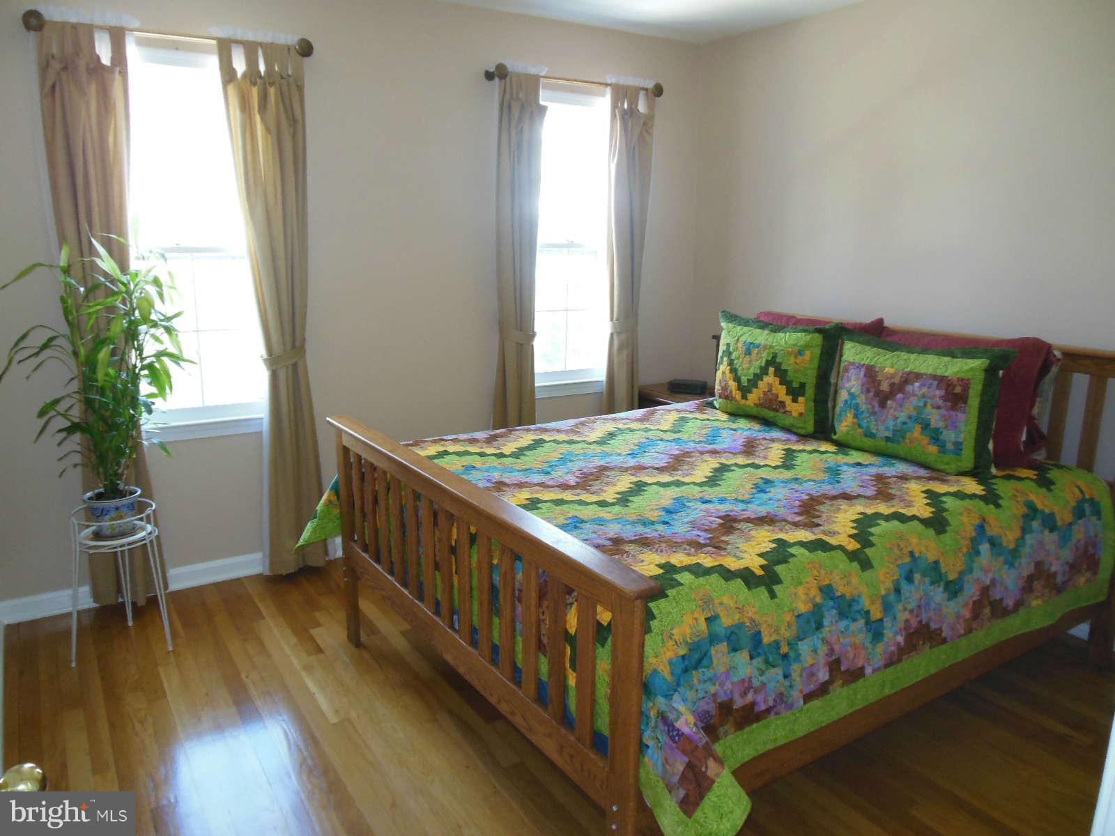 1608 Arbor View Road Silver Spring, MD 20902 - Photo 16 of 28 a bedroom with a bed and a window