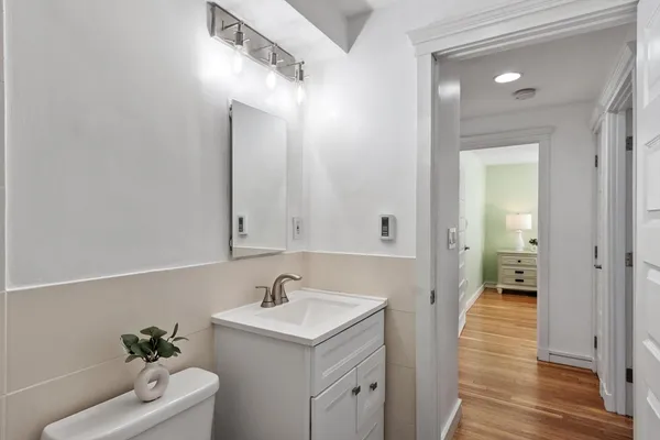 a bathroom with a sink a toilet and a bathtub
