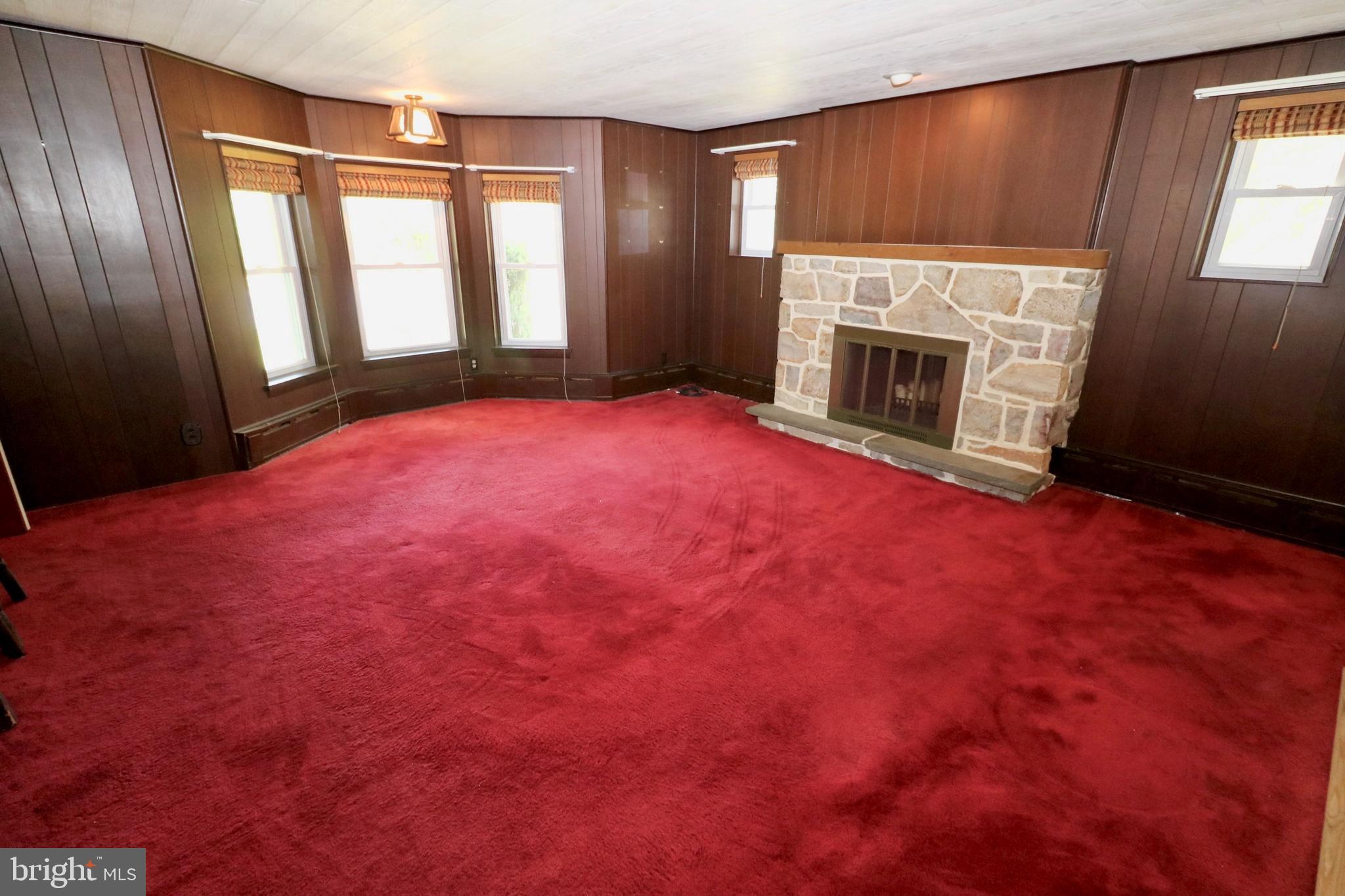 257 Valley Road Birdsboro, PA 19508 - Photo 13 of 21 LIVING ROOM WITH WOOD-BURNING FIREPLACE