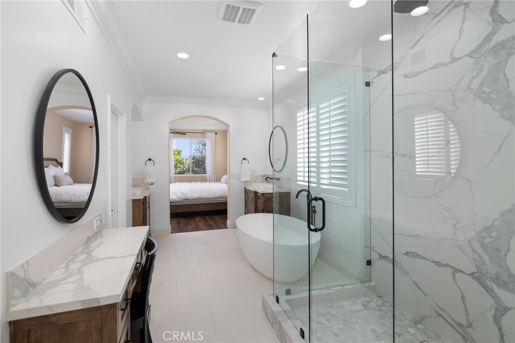 45644 Camino Rubi Temecula, CA 92592 - Photo 19 of 51 a bedroom with furniture and a mirror