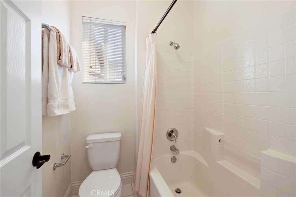 45644 Camino Rubi Temecula, CA 92592 - Photo 27 of 51 a bathroom with a toilet and a shower