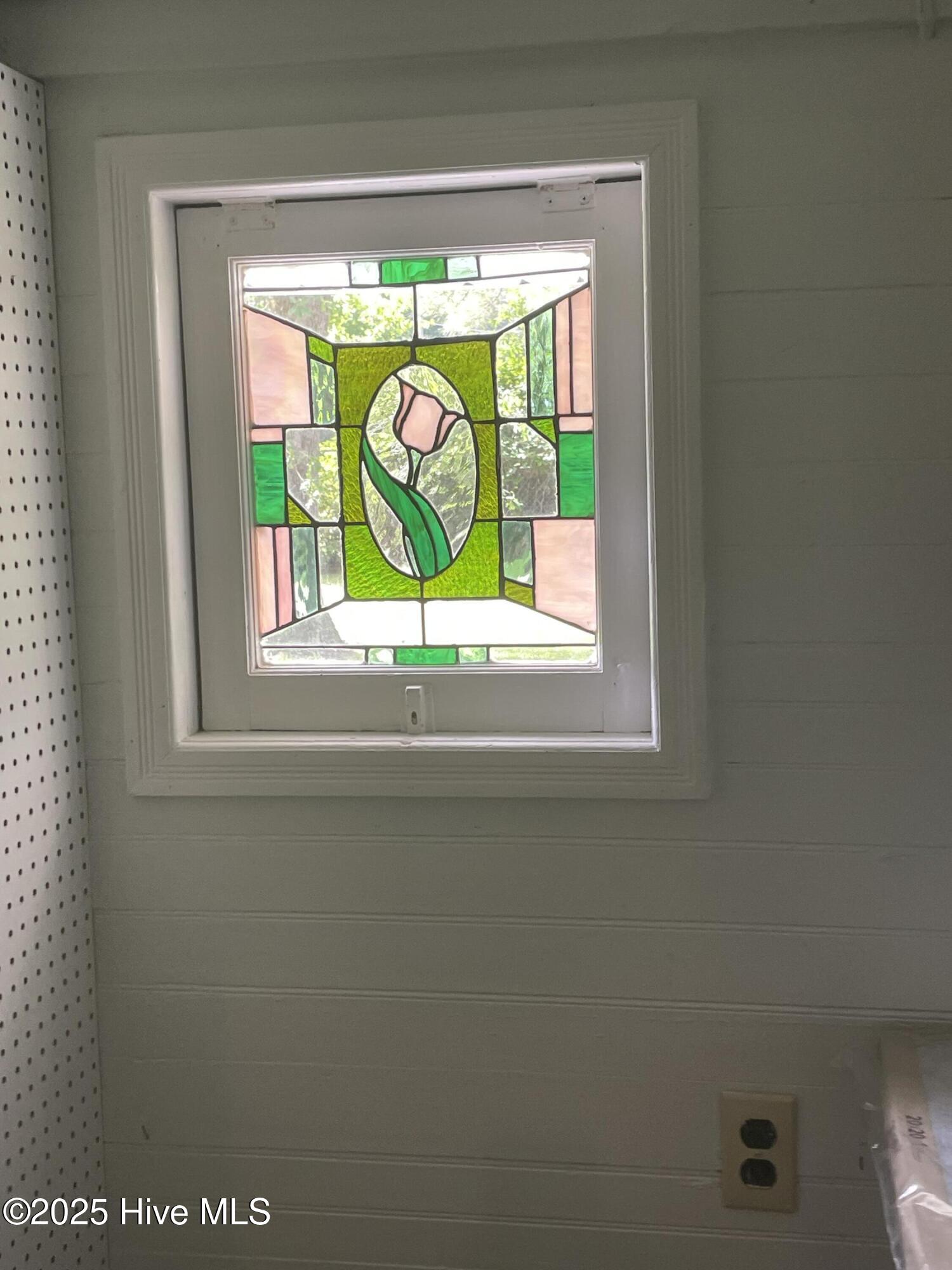 958 Holly Road Lakeview, NC 28350 - Photo 8 of 18 Lovely stained glass window