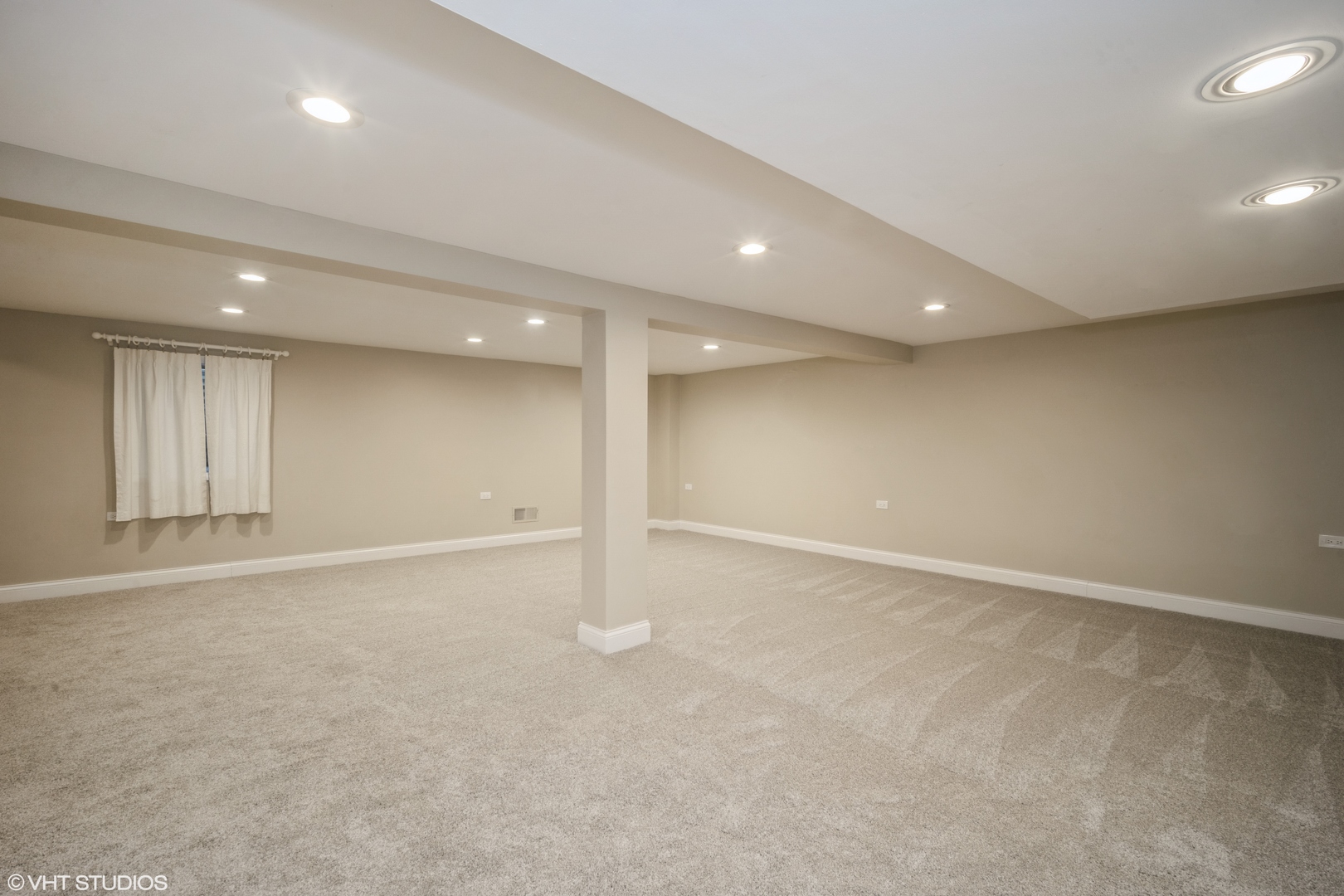 Undisclosed Address Northbrook, IL 60062 - Photo 3 of 9 an empty room with window and pillar in it