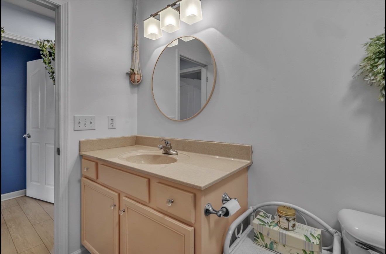 1589 Hedgewood Road Clarksville, TN 37042 - Photo 22 of 30 a bathroom with a sink and a mirror