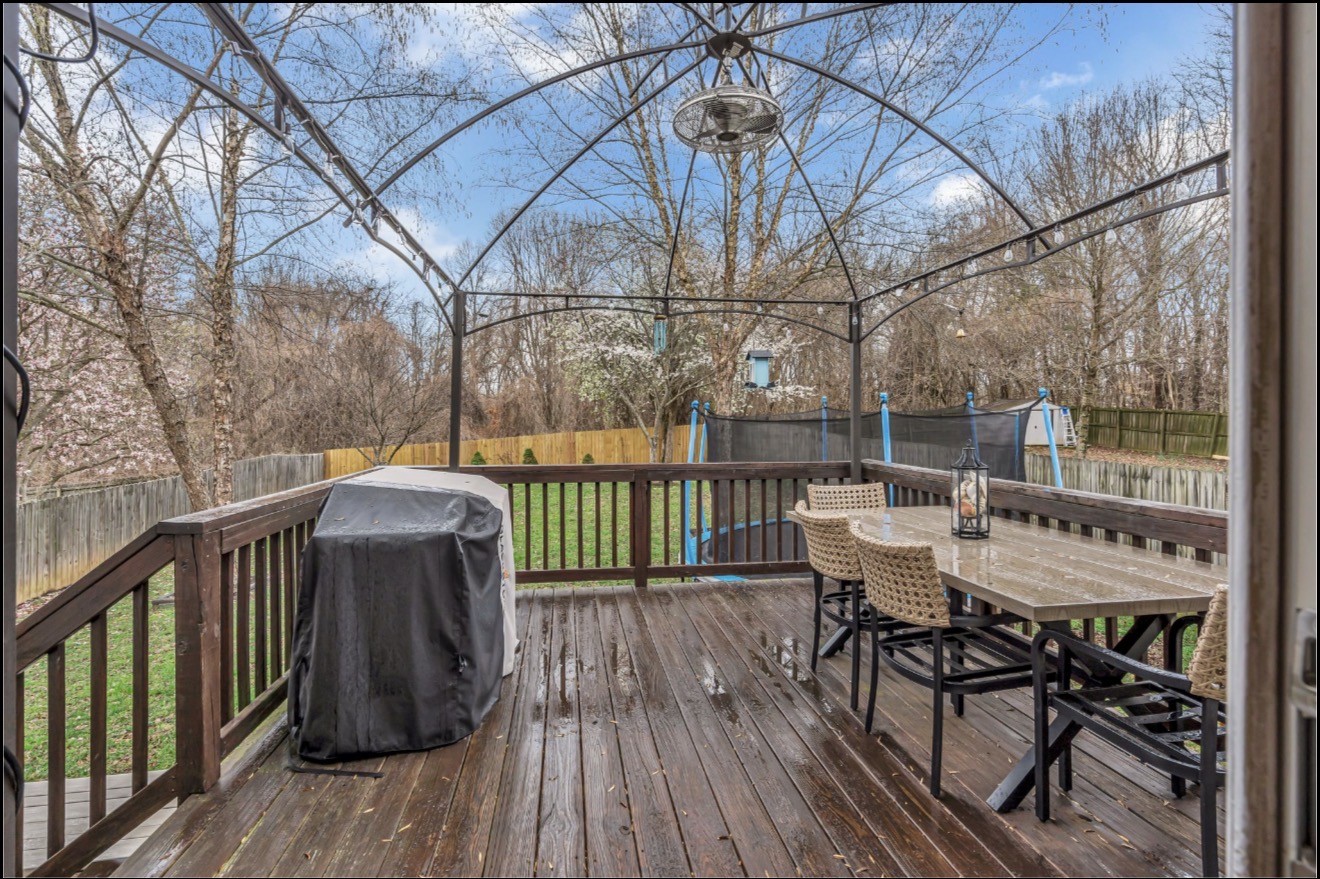 1589 Hedgewood Road Clarksville, TN 37042 - Photo 29 of 30 a view of a chairs and table on the deck