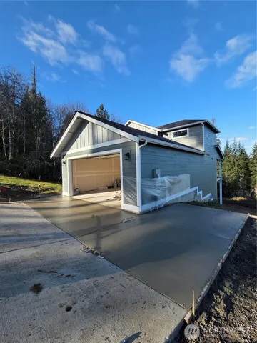 a view of a hallway with paintings on the wall