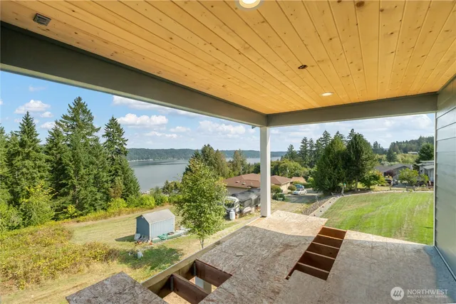 an aerial view of a house with outdoor space