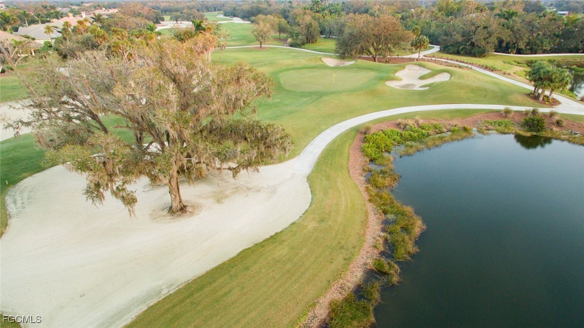 13071 Pebblebrook Point Circle, Unit 201 Fort Myers, FL 33905 - Photo 39 of 41 a view of a swimming pool with a yard