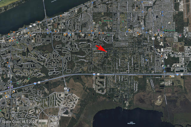 3395 Turtle Mound Road Melbourne, FL 32934 - Photo 15 of 48 a small white building sitting in the middle of a balcony