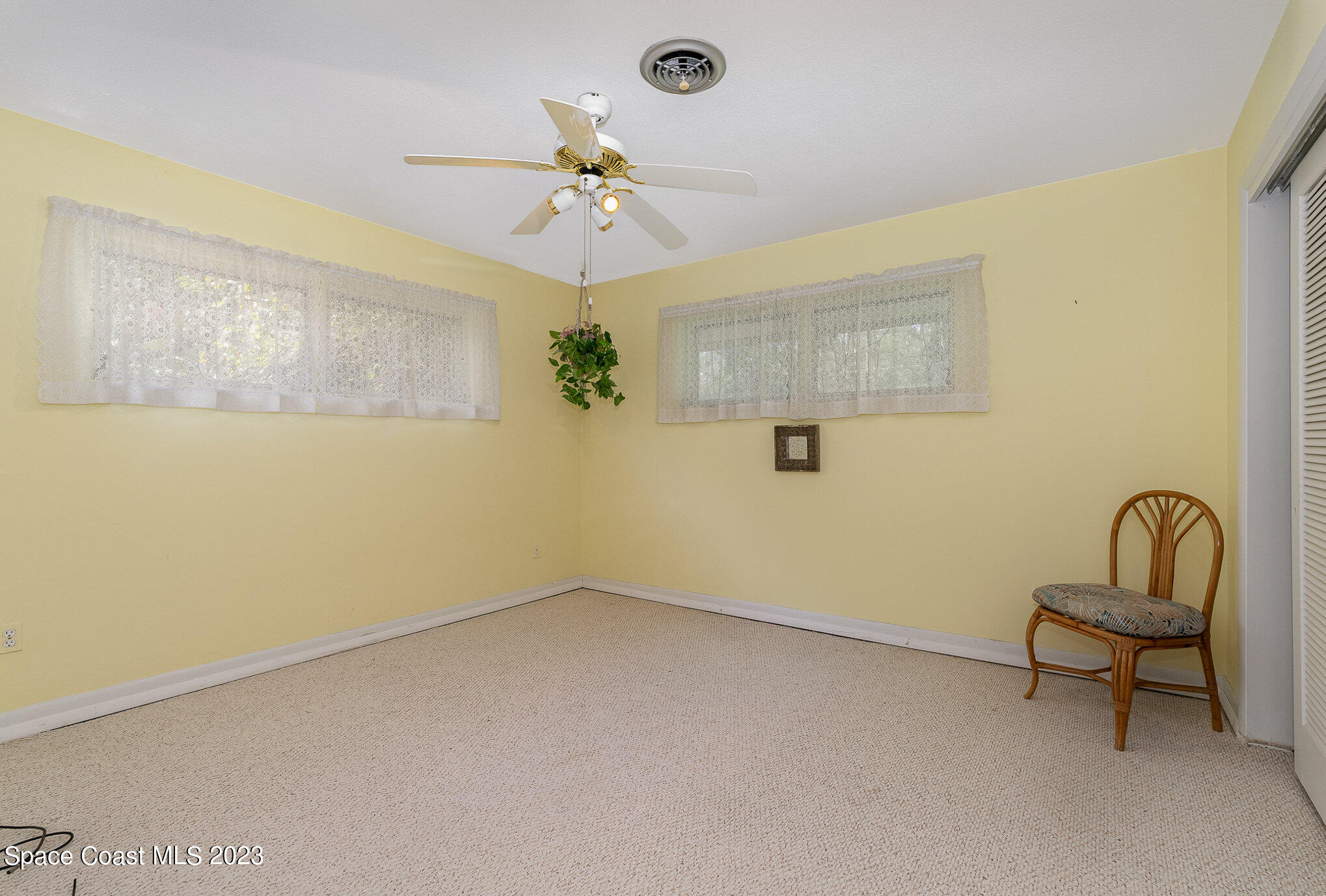 3395 Turtle Mound Road Melbourne, FL 32934 - Photo 25 of 48 a view of workspace with fan