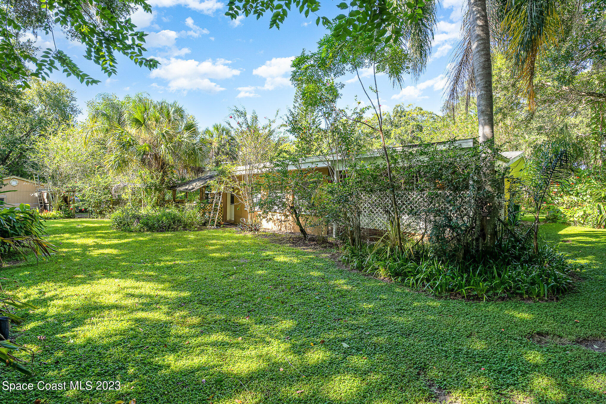 3395 Turtle Mound Road Melbourne, FL 32934 - Photo 38 of 48 a view of yard with green space