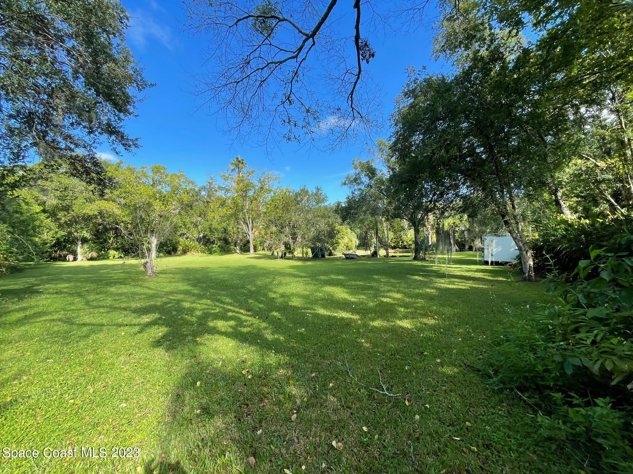 3395 Turtle Mound Road Melbourne, FL 32934 - Photo 46 of 48 a view of green field