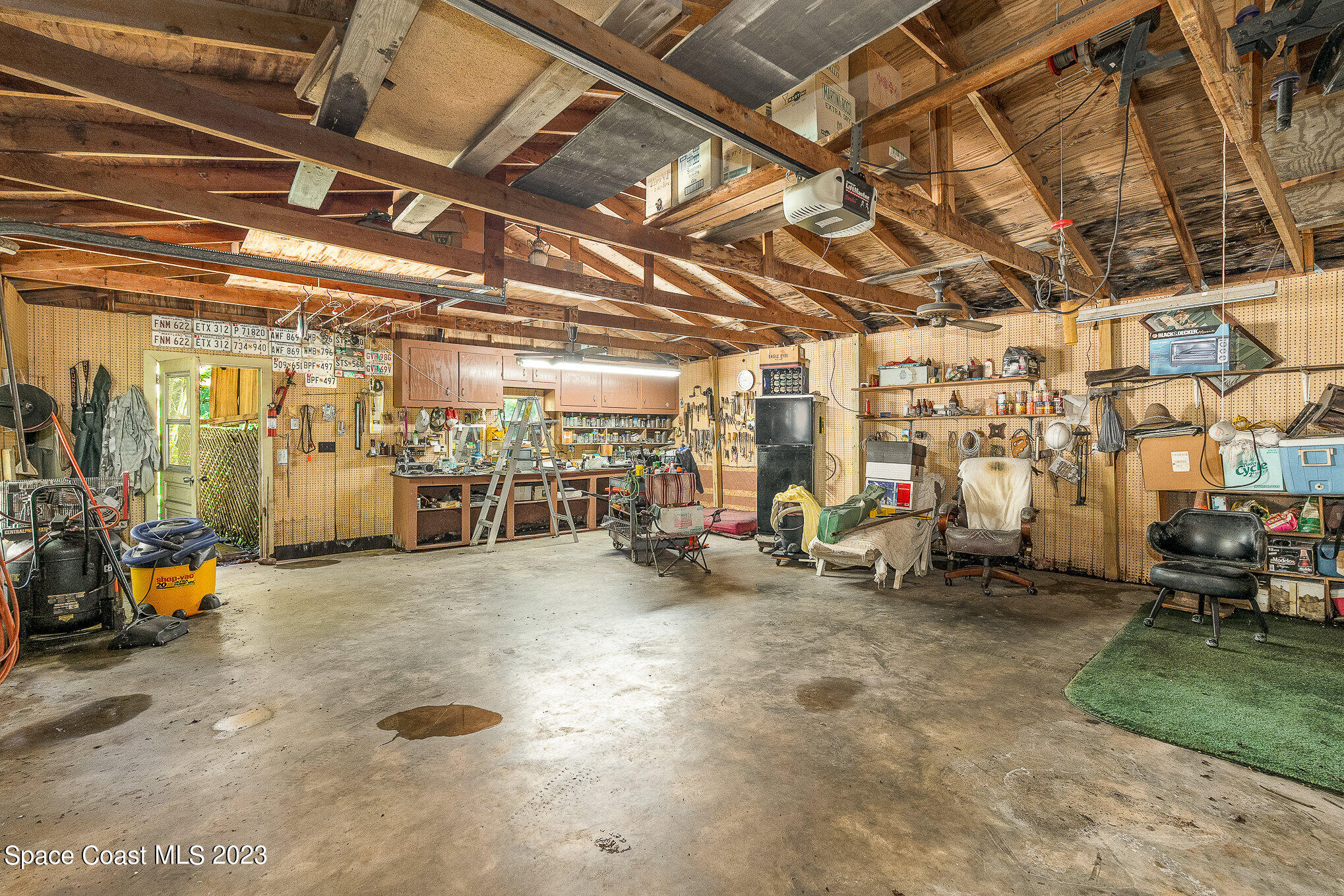 3395 Turtle Mound Road Melbourne, FL 32934 - Photo 9 of 48 a view of a room with gym equipment