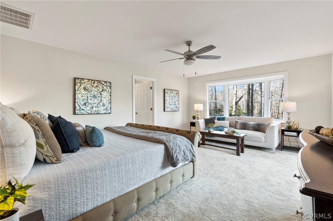4620 Crossgate Road Chester, VA 23831 - Photo 23 of 49 Spacious primary suite features incredible lake views from the large bay window and direct access to the main deck!