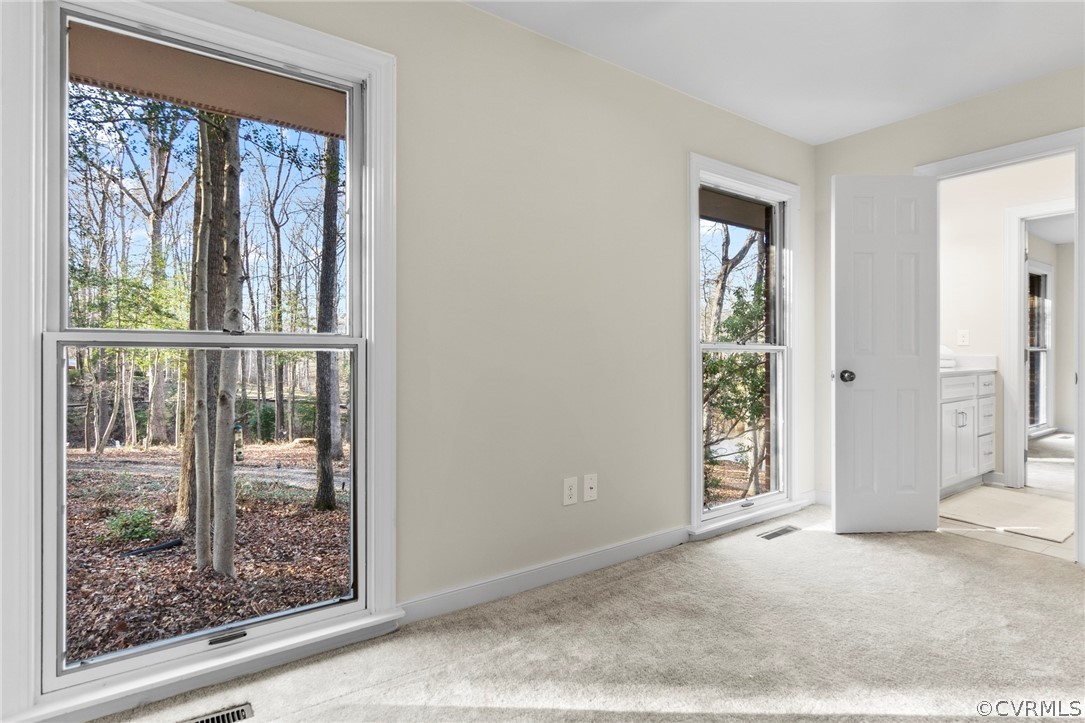 4620 Crossgate Road Chester, VA 23831 - Photo 34 of 49 an empty room with wooden floor and windows