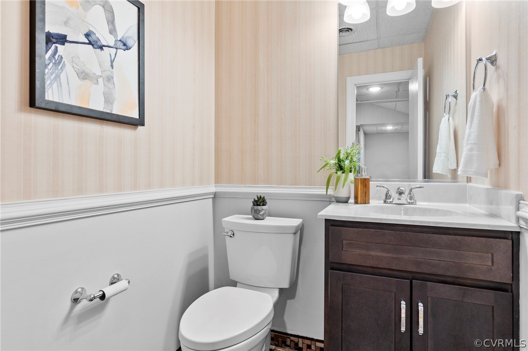4620 Crossgate Road Chester, VA 23831 - Photo 41 of 49 a bathroom with a toilet a sink and mirror