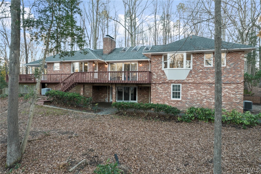 4620 Crossgate Road Chester, VA 23831 - Photo 48 of 49 a front view of a house with garden