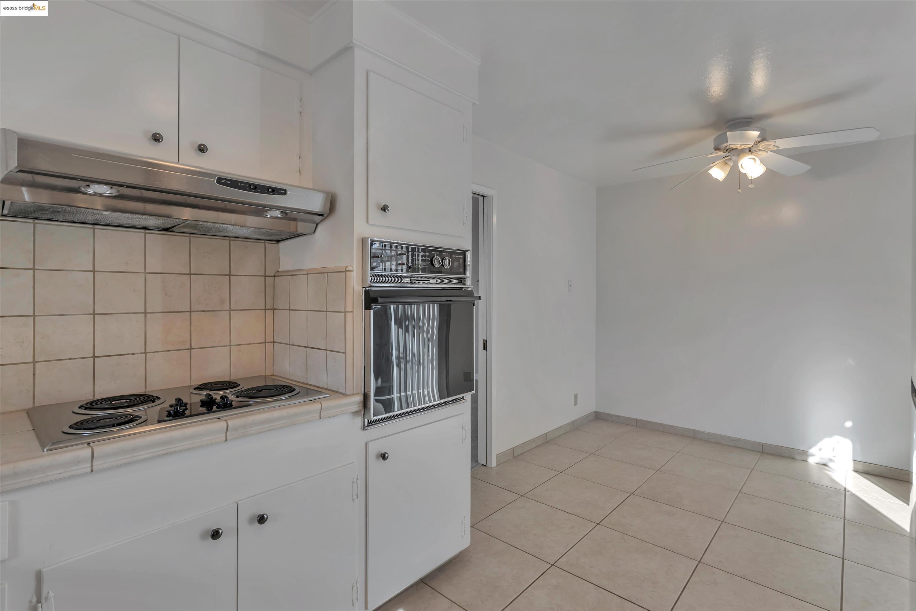 840 Sevely Drive Mountain View, CA 94041 - Photo 9 of 19 a kitchen with a sink cabinets and appliances