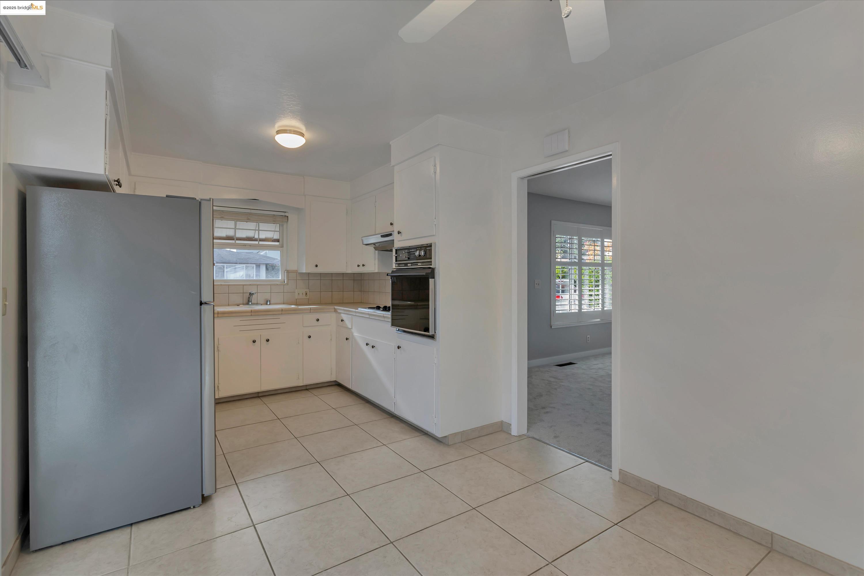 840 Sevely Drive Mountain View, CA 94041 - Photo 10 of 19 a view of a kitchen with white cabinets