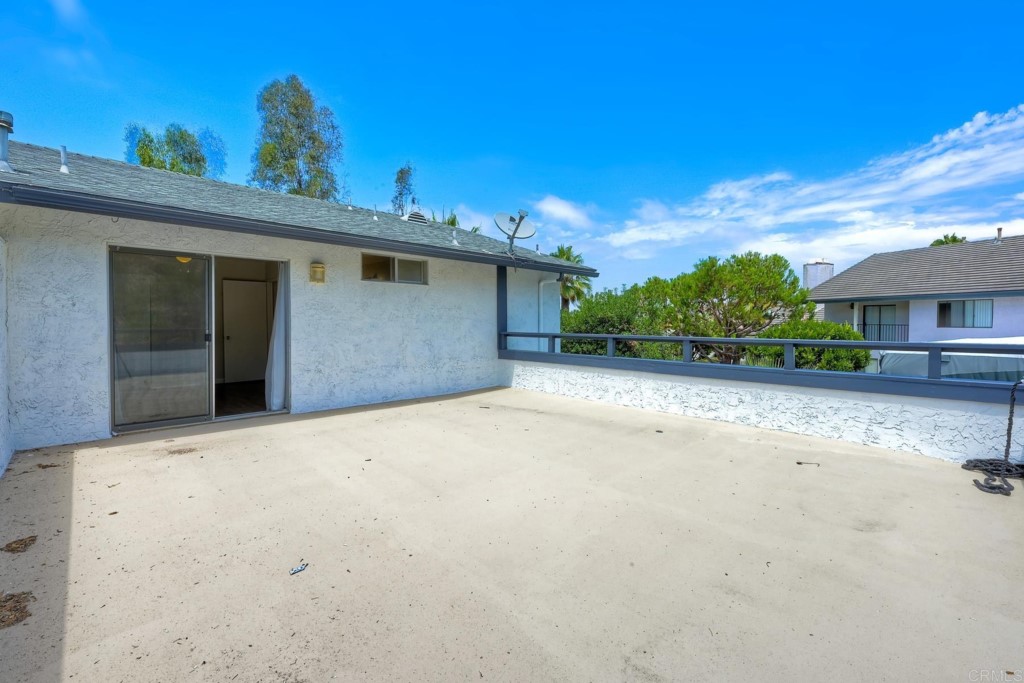 2425-27 Torrejon Place Carlsbad, CA 92009 - Photo 20 of 59 a view of a house with a backyard