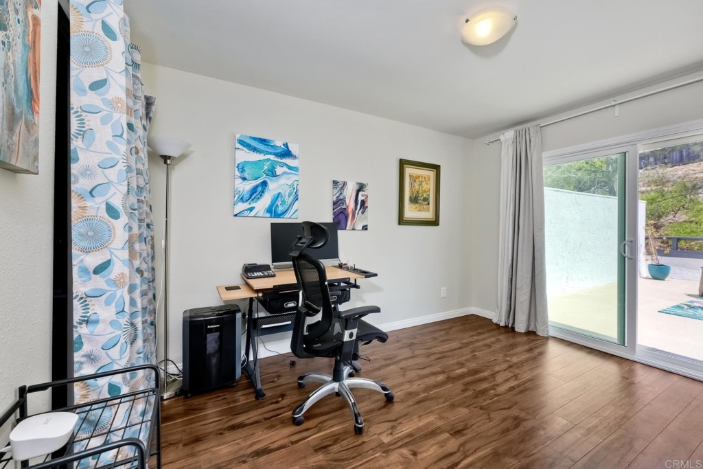 2425-27 Torrejon Place Carlsbad, CA 92009 - Photo 45 of 59 a view of a workspace with furniture and a window