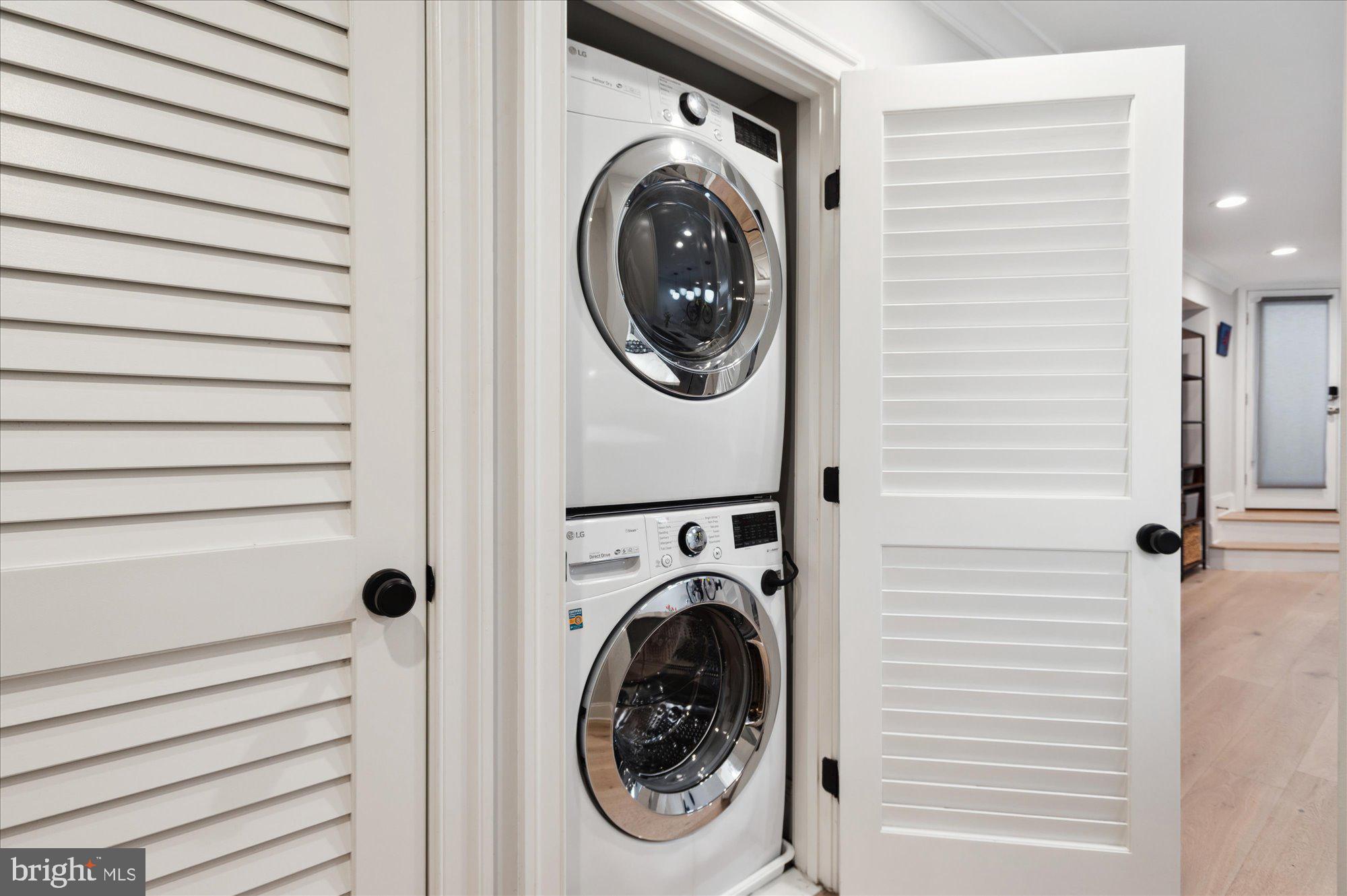 2150 Florida Avenue Northwest, Unit 1 Washington, DC 20008 - Photo 9 of 23 a utility room with dryer and washer