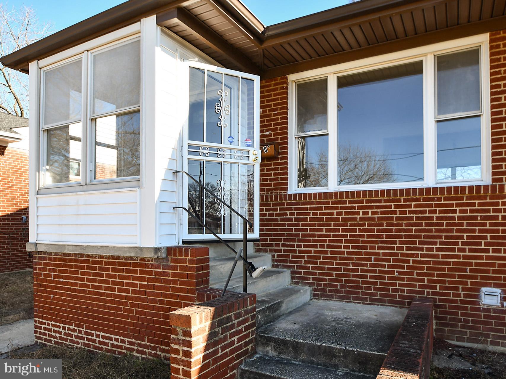 2308 Senator Avenue District Heights, MD 20747 - Photo 11 of 66 a view of a brick house with many windows