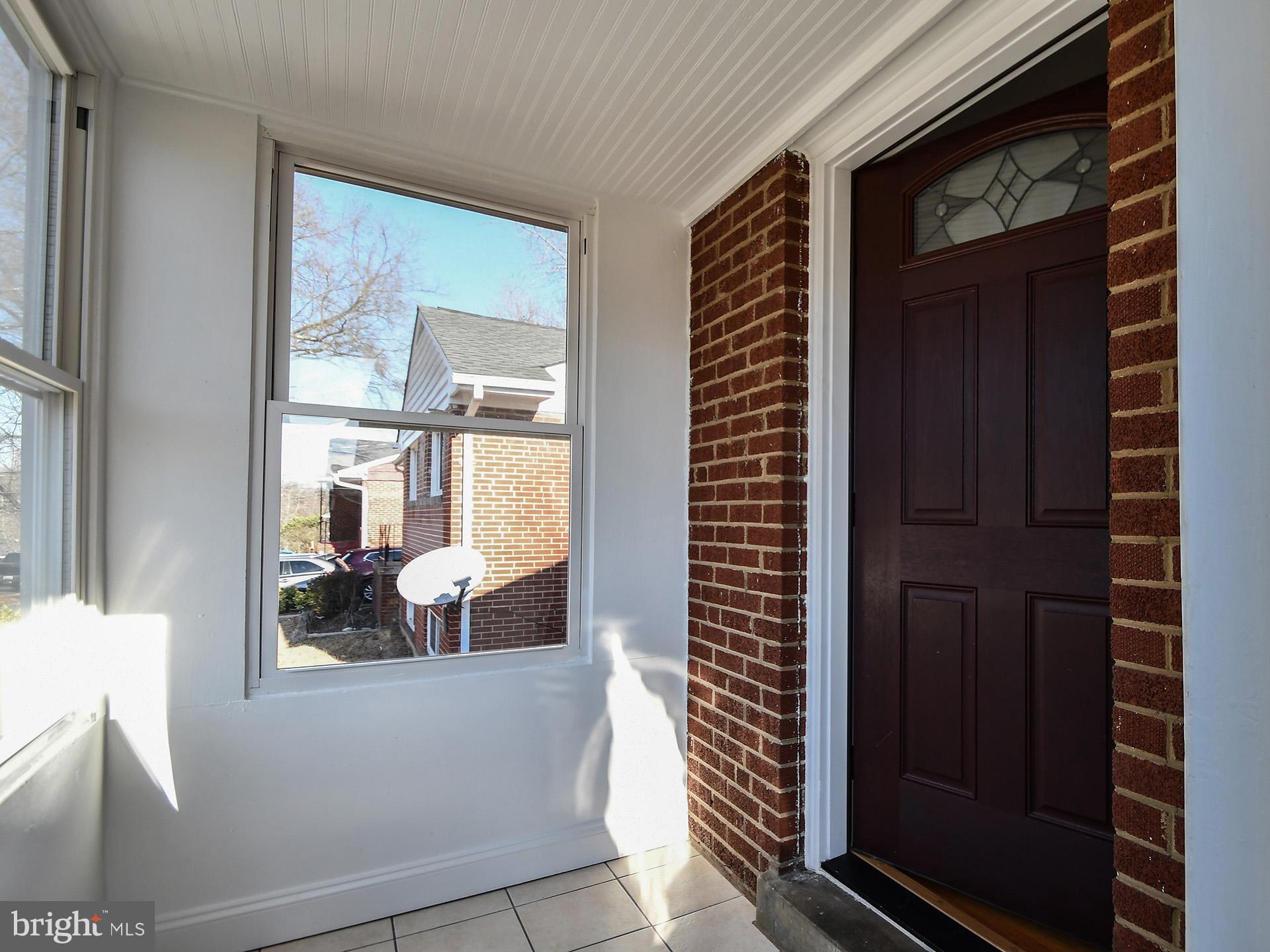 2308 Senator Avenue District Heights, MD 20747 - Photo 12 of 66 a view of living room with furniture and windows