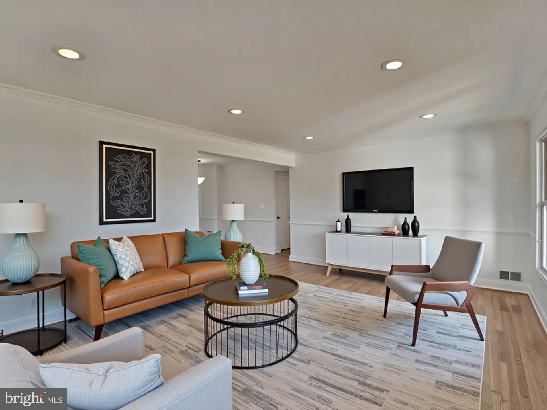 2308 Senator Avenue District Heights, MD 20747 - Photo 14 of 66 a living room with furniture and a flat screen tv