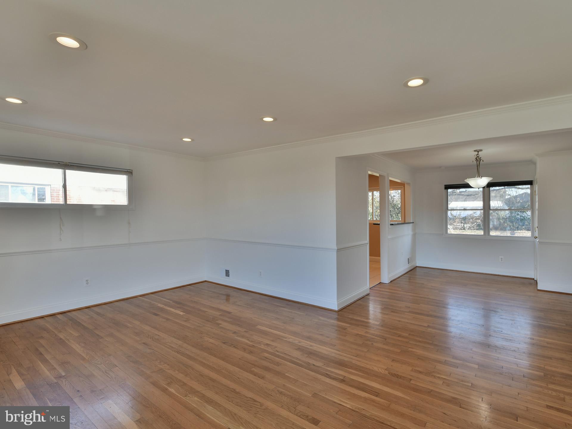 2308 Senator Avenue District Heights, MD 20747 - Photo 15 of 66 an empty room with wooden floor and windows