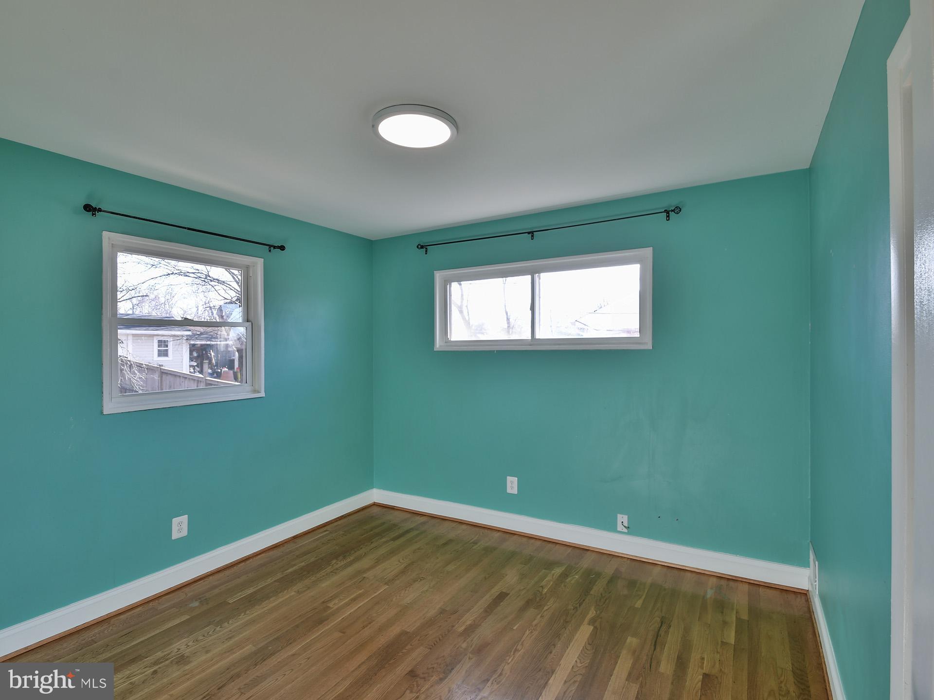 2308 Senator Avenue District Heights, MD 20747 - Photo 28 of 66 a view of a room with wooden floor and windows