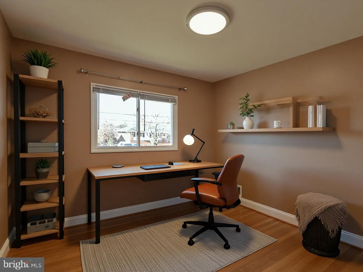 2308 Senator Avenue District Heights, MD 20747 - Photo 36 of 66 a view of a workspace with furniture and a window