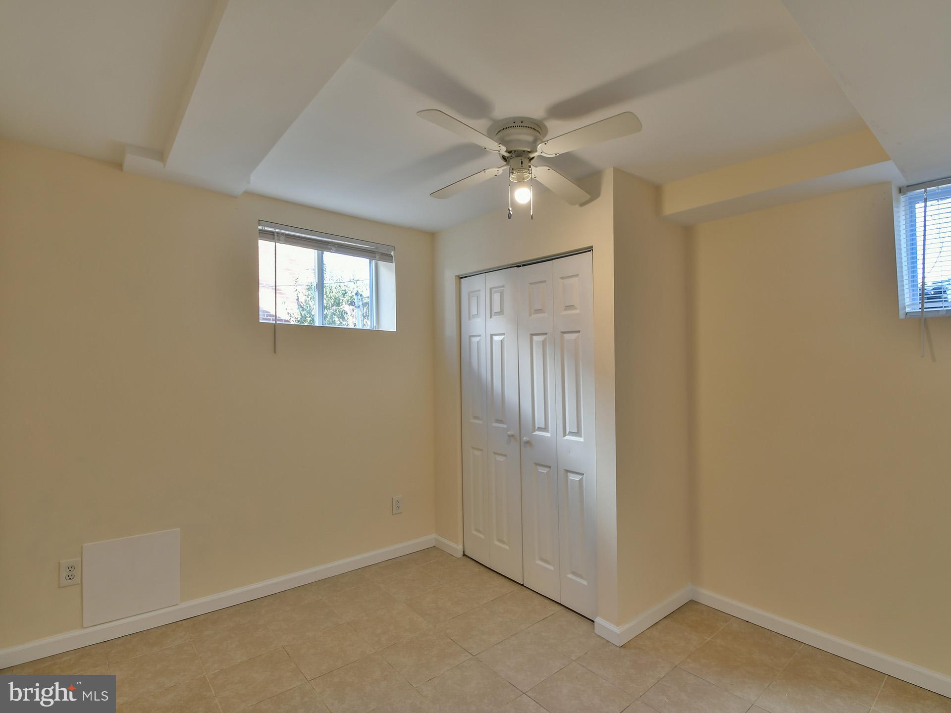 2308 Senator Avenue District Heights, MD 20747 - Photo 55 of 66 an empty room with windows and fan
