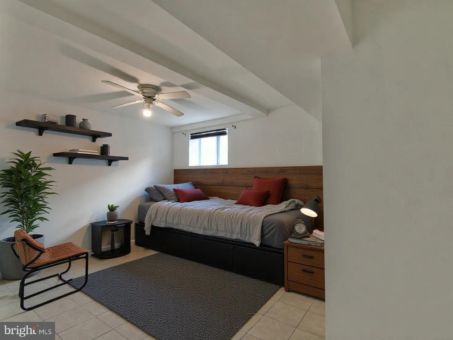 2308 Senator Avenue District Heights, MD 20747 - Photo 59 of 66 a living room with furniture and a chandelier