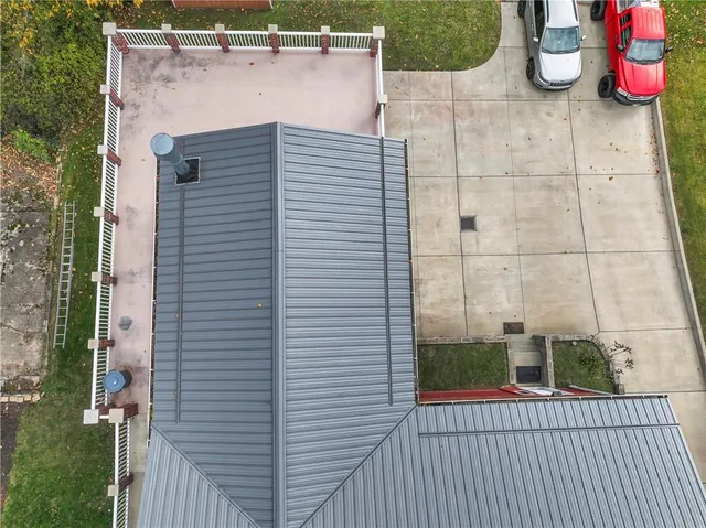 a view of a door and chair in the balcony