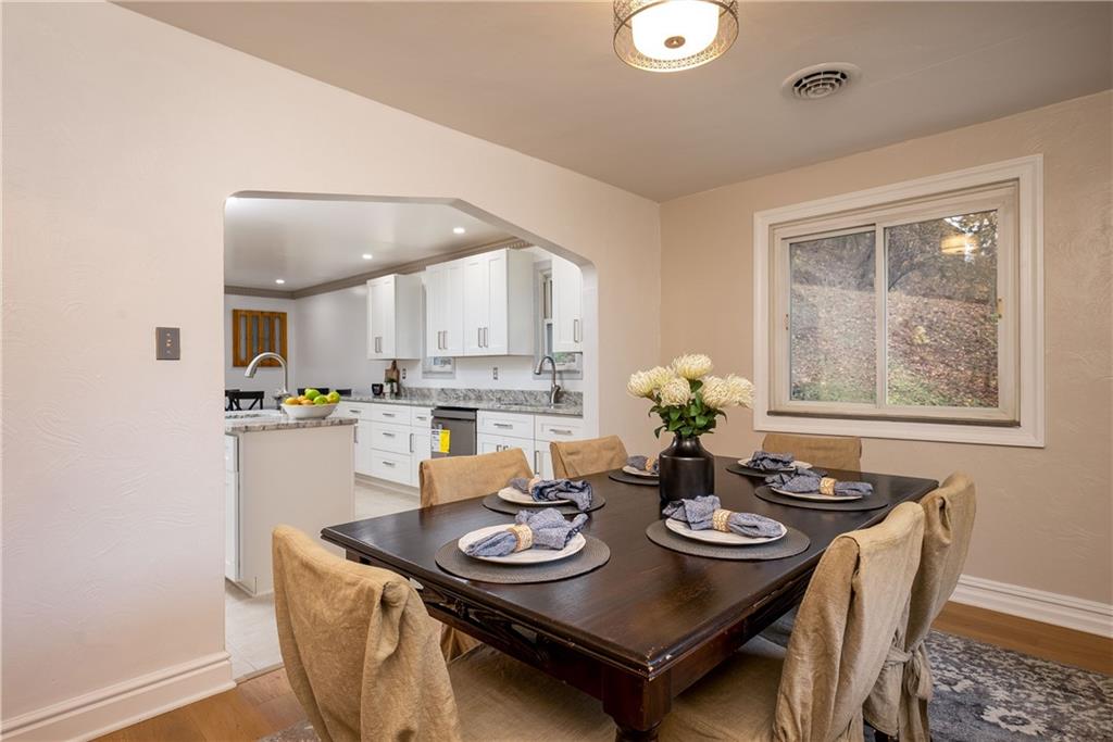 149 Three Degree Road Pittsburgh, PA 15237 - Photo 19 of 50 a view of a dining room with furniture and chandelier